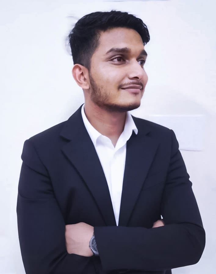 A professional portrait of Prem Sah.